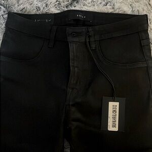 DSTLD Authentic matte wax coated DSTLD black skinny jeans.